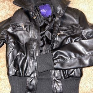 Miley Cyrus black pleather jacket